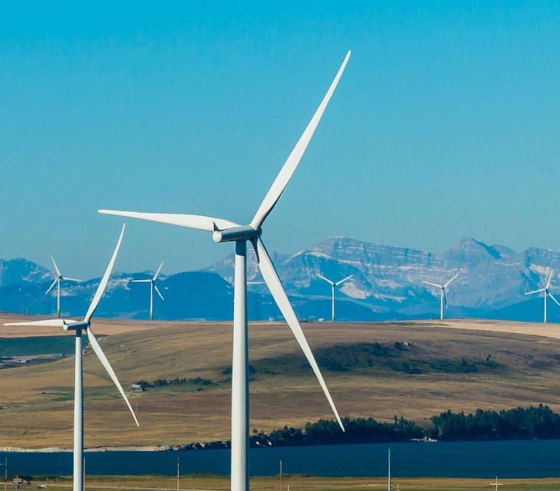 Windmills in an open landscape.