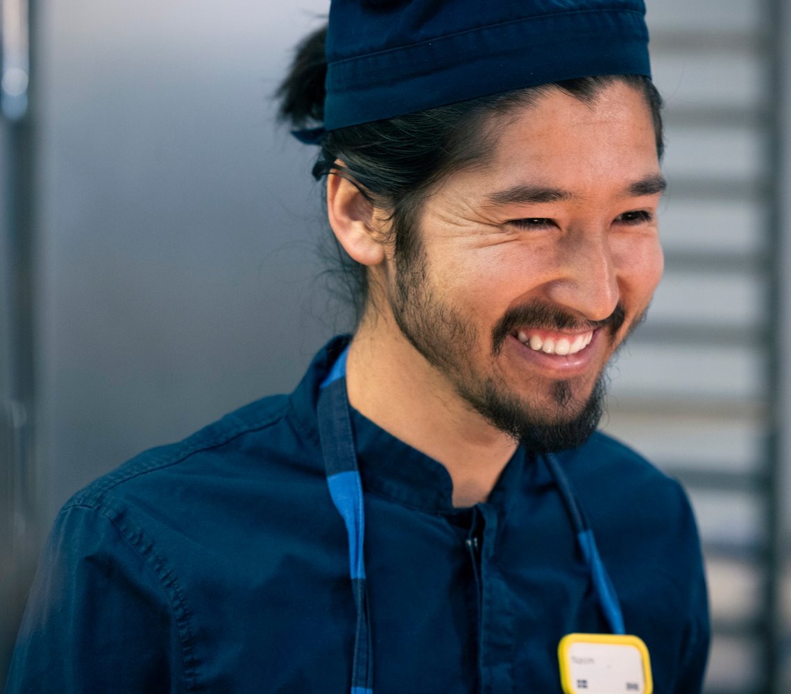 IKEA restaurant co-worker smiling.
