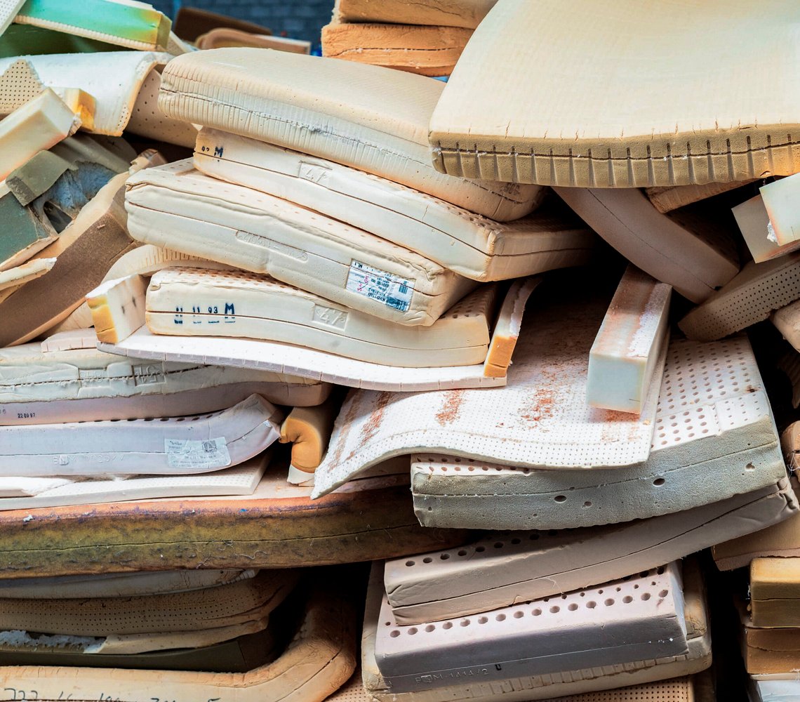 A pile of used and abandoned matresses.