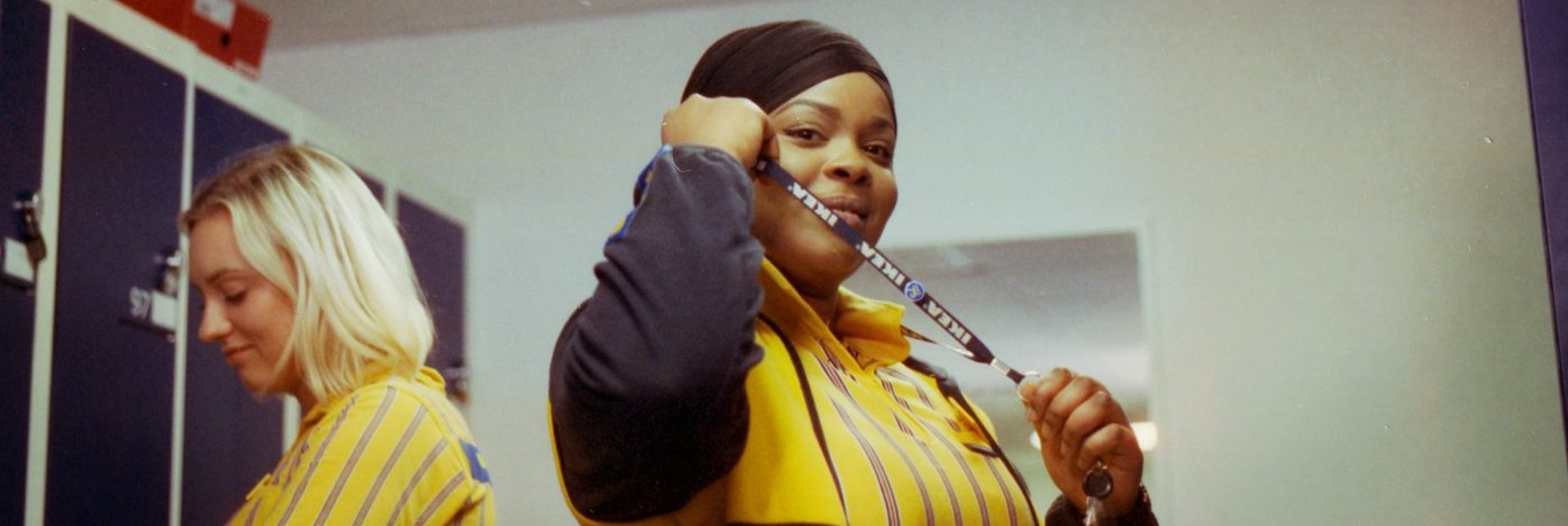 Female store co-worker in IKEA uniform