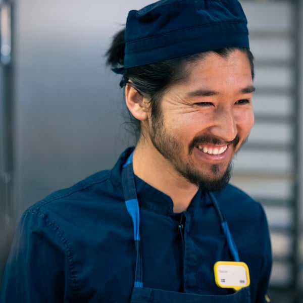 IKEA restaurant co-worker smiling.