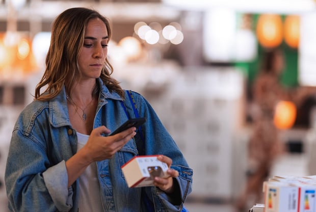 Customer scanning a product an IKEA store