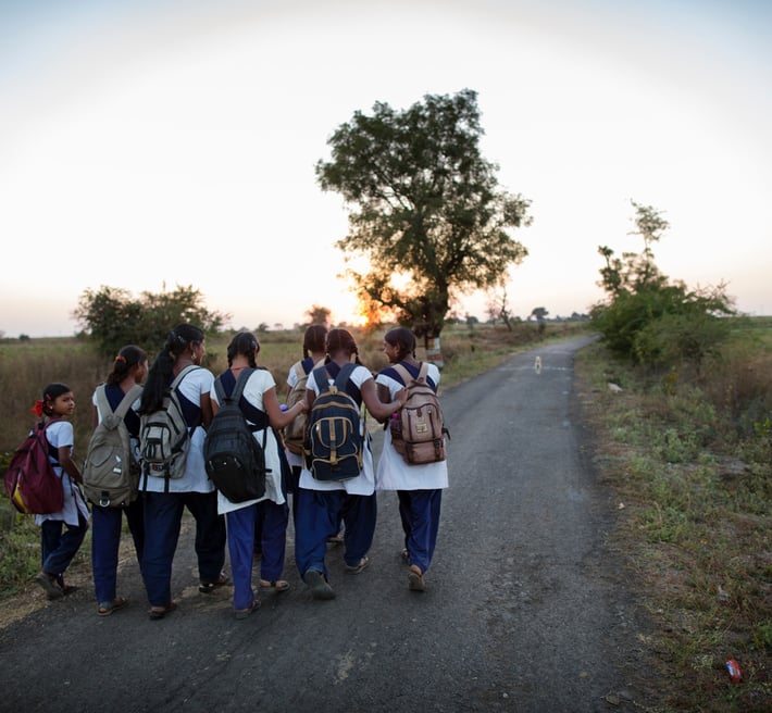 A group of schoolgirls on their way to school.
