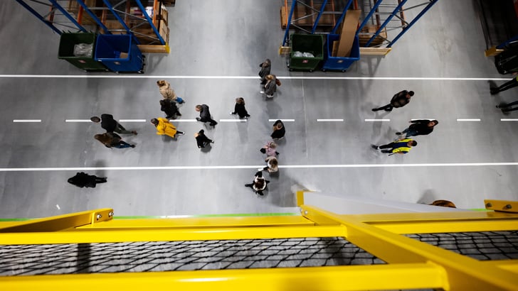 View from above, people walking in an IKEA store