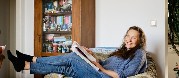 Woman sitting in a sofa