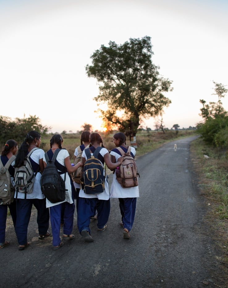 A group of schoolgirls on their way to school.